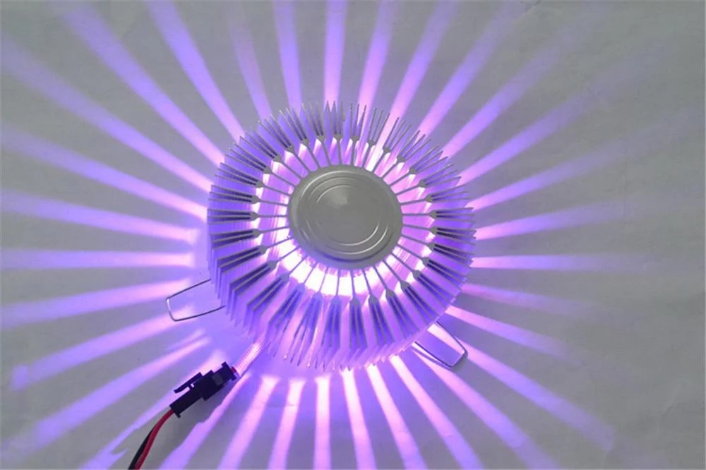 Lampa ścienna Werner Sunflower z aluminium i kryształu