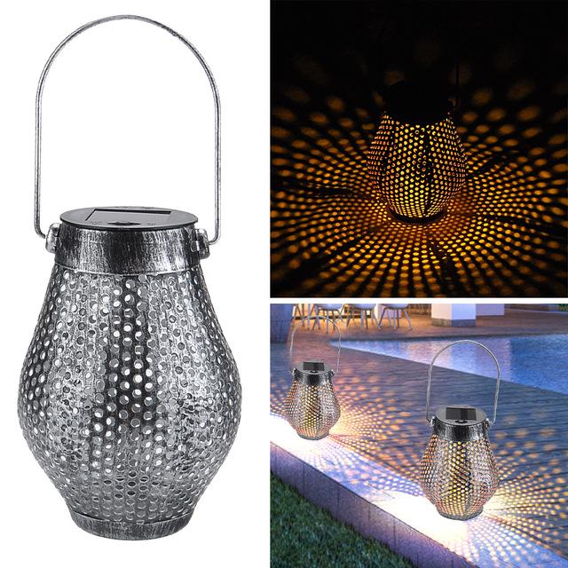Zaid Solar Outdoor Shadow Cast Lantern in Iron and Plastic