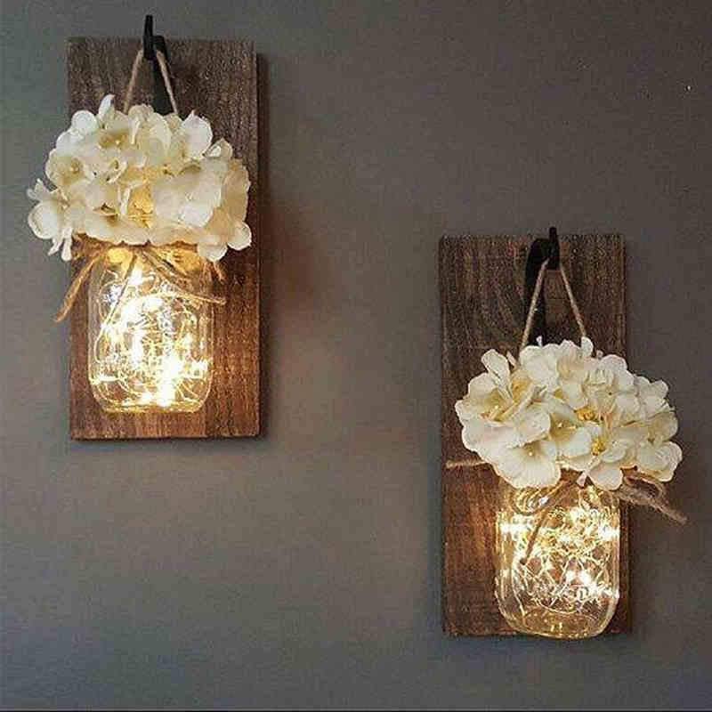 Jinx väggmonterad mason jar-lampa med ljusslinga och hortensior