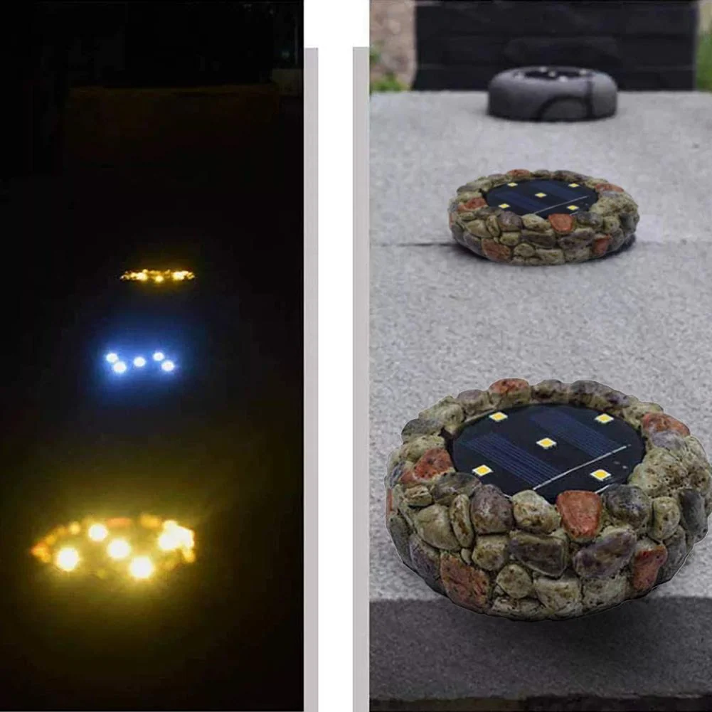 Kobblestensformad solcellsdriven LED-lampa i keramik och plast för trädgårdsrabatter