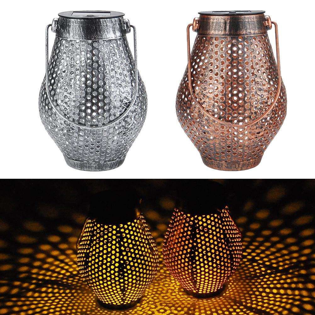Zaid Solar Outdoor Shadow Cast Lantern in Iron and Plastic