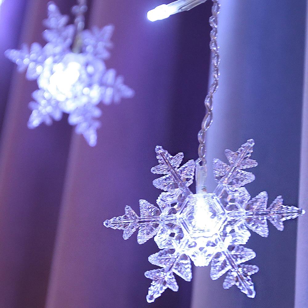 Set van 16 hangende LED-sneeuwvloklampen