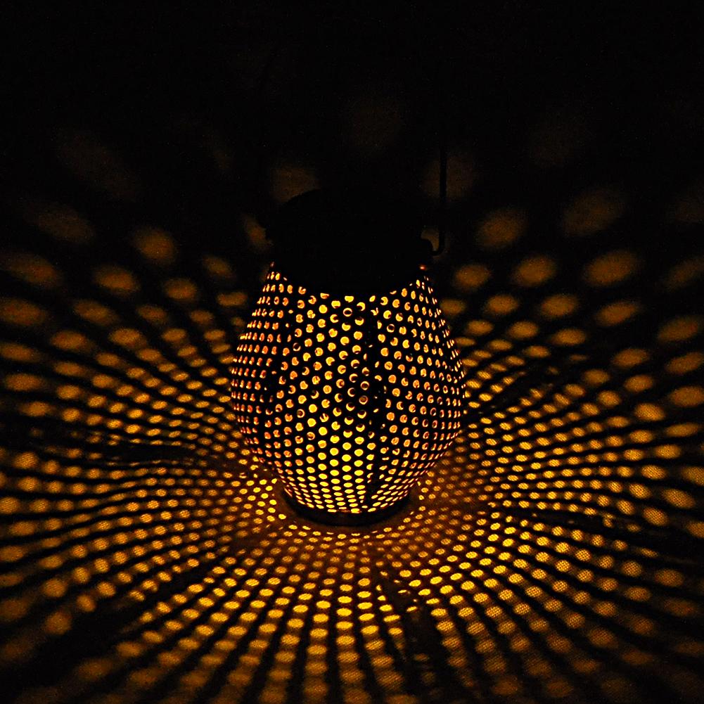 Zaid Solar Outdoor Shadow Cast Lantern in Iron and Plastic