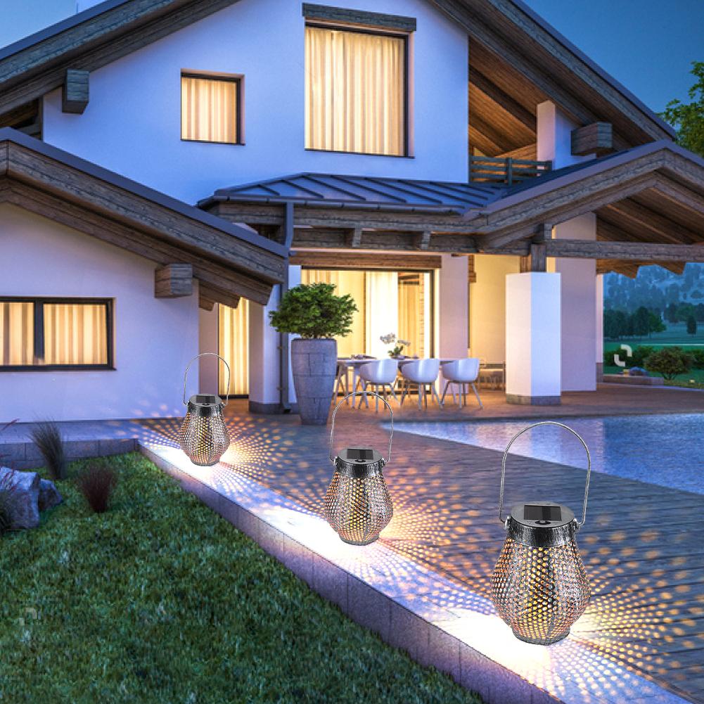 Zaid Solar Outdoor Shadow Cast Lantern in Iron and Plastic