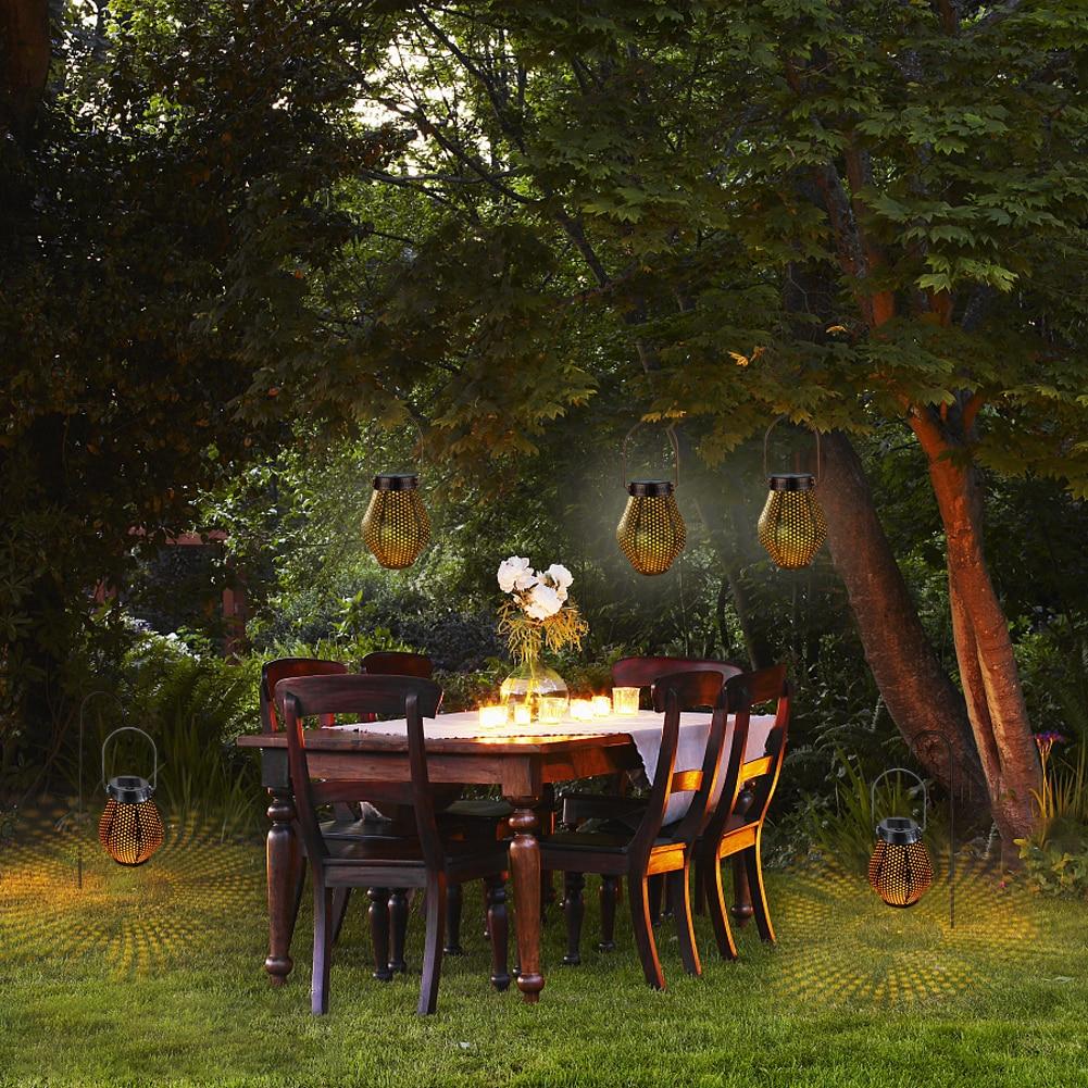Zaid Solar Outdoor Shadow Cast Lantern in Iron and Plastic