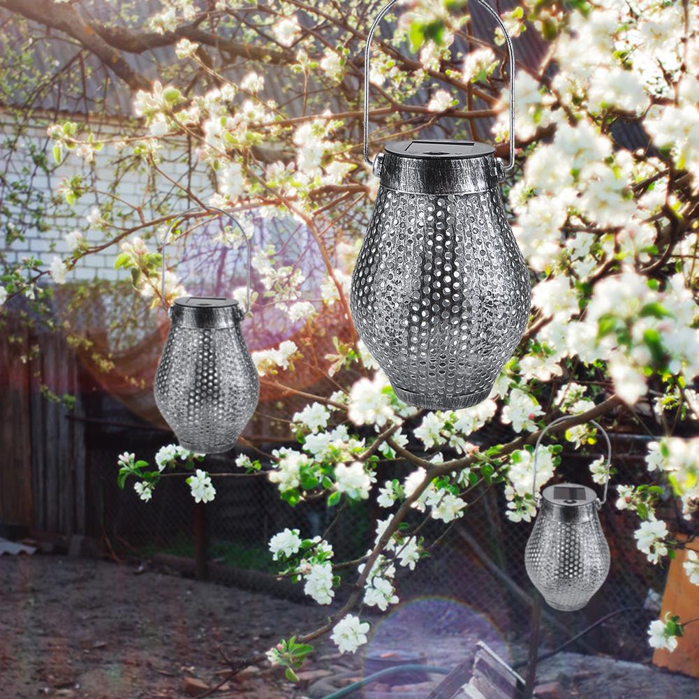 Zaid Solar Outdoor Shadow Cast Lantern in Iron and Plastic