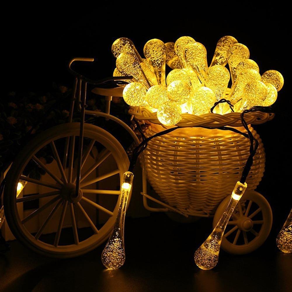 Ogrodowe lampki solarne z żarówkami LED w kształcie kropli