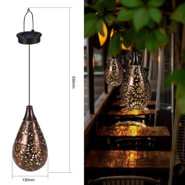 Wisząca lampa ogrodowa Milton Solar z kryształową kroplą wody i rzeźbionym kwiatem
