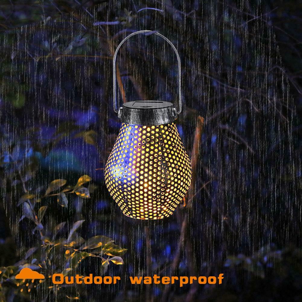 Zaid Solar Outdoor Shadow Cast Lantern in Iron and Plastic
