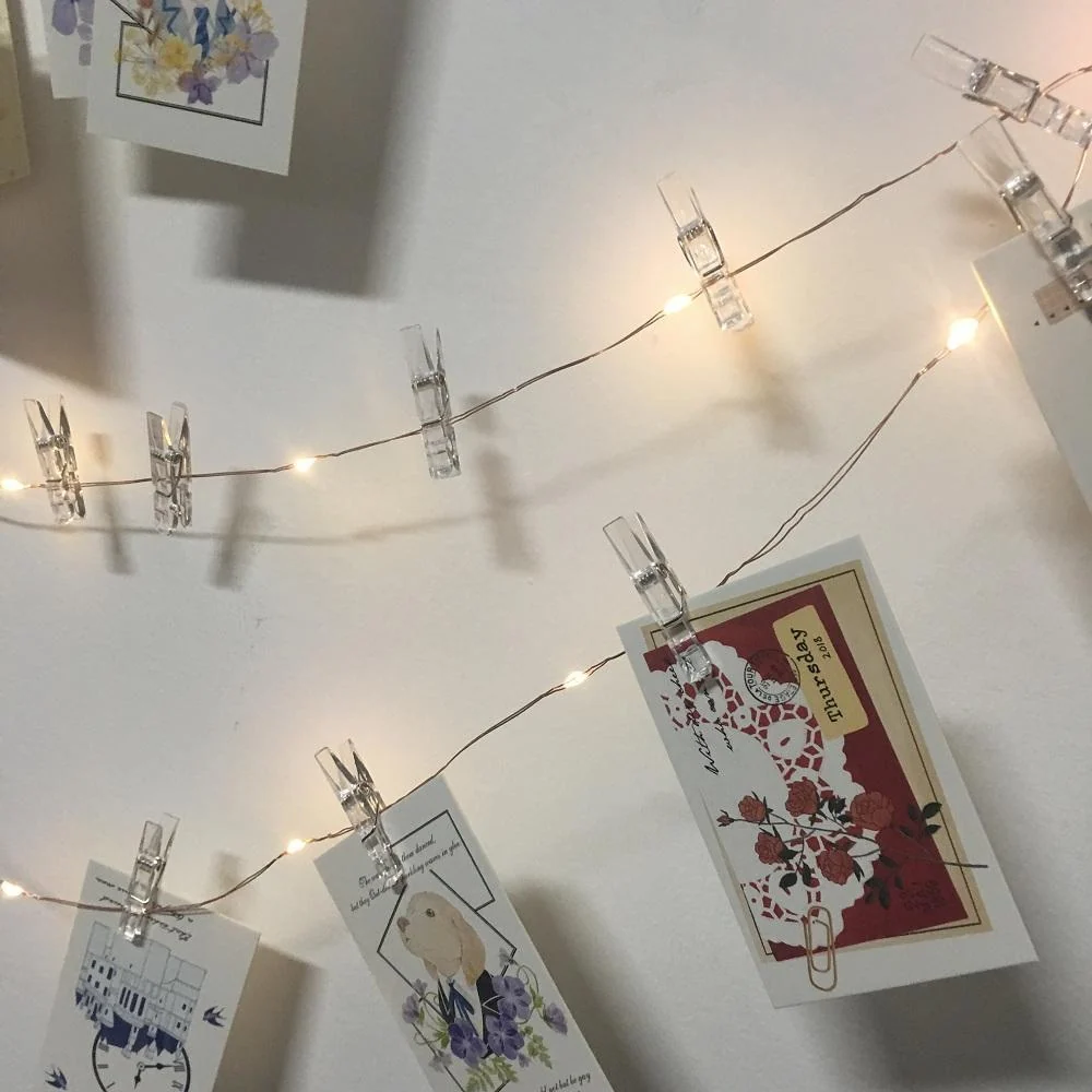 LED-lyssnor med fotoclips i varm hvid